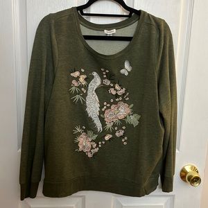 Olive green long sleeve top with pink bird and flower stiching